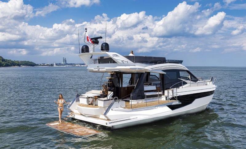 Motor yacht on the water near the coast